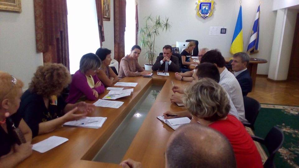 Мешканців будинків